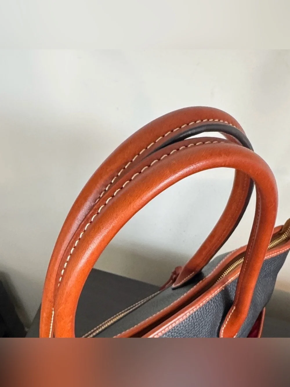 Dooney & Bourke Pebble Grain Tote bag in black with tan leather trim